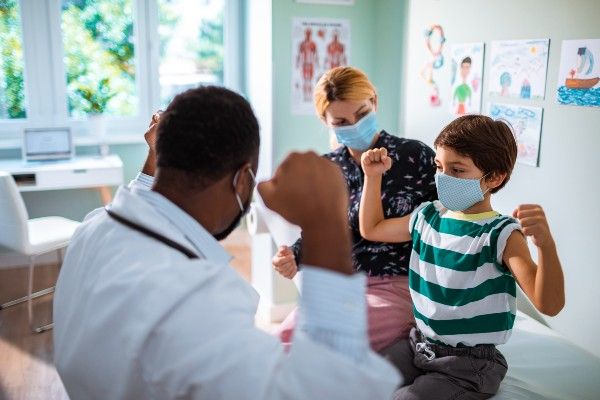 Image of a doctor and a child